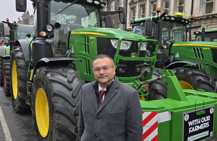 Peter next to a tractor